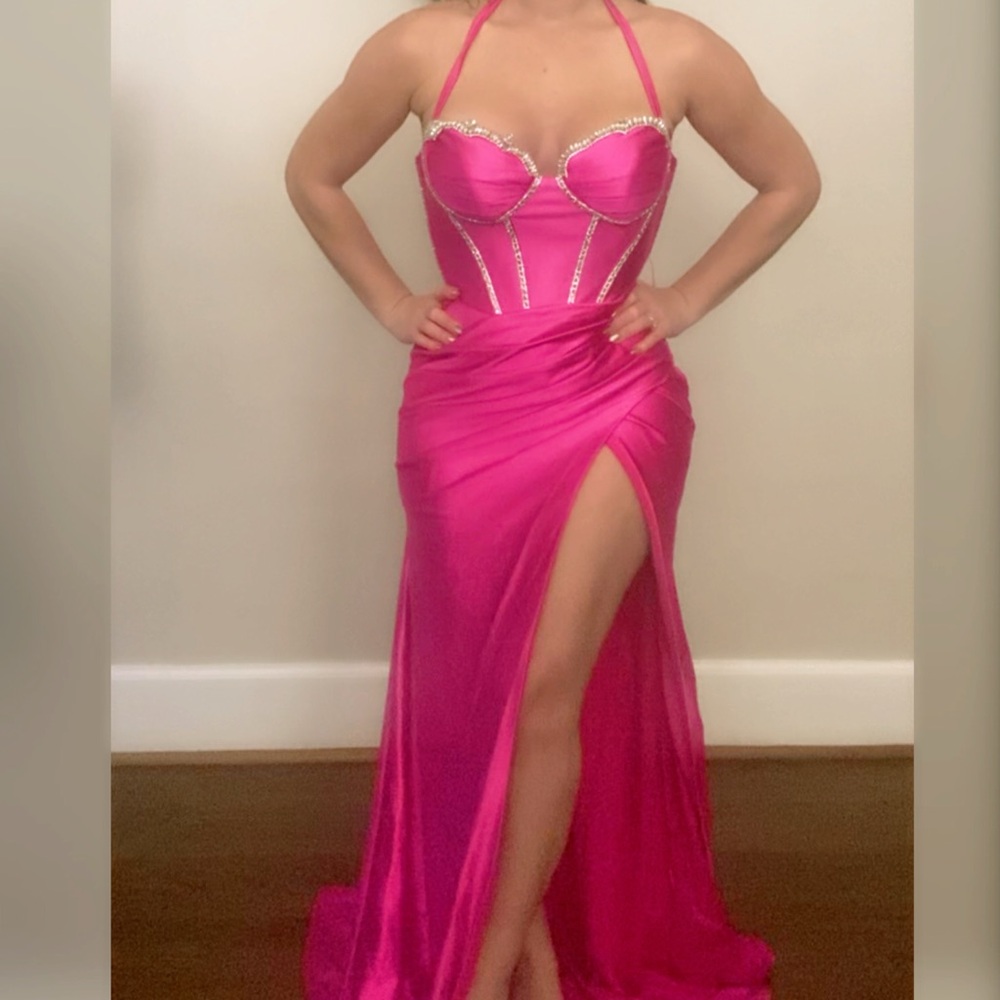 Pink tight fitted prom dress with sparkly rhinestones and leg slit